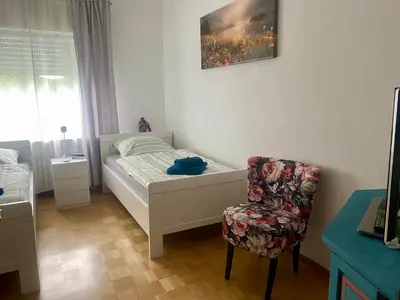 Ein Bett oder Betten in einem Zimmer der Unterkunft Ferienhaus Schmidt am Rhein