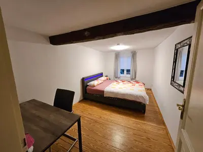 Ein Bett oder Betten in einem Zimmer der Unterkunft Doppelhaushälfte Naturglück