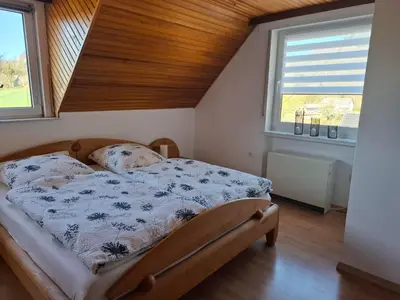 Ein Bett oder Betten in einem Zimmer der Unterkunft Ferienwohnung Eifelruhe