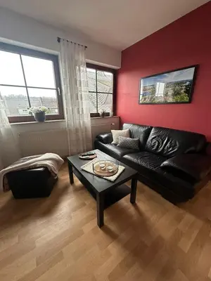 Ein Sitzbereich in der Unterkunft Ferienwohnung Katharina im Weinort an der Mosel