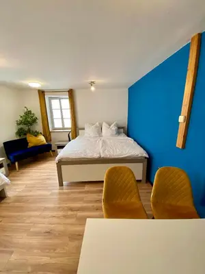 Ein Bett oder Betten in einem Zimmer der Unterkunft Ferienhaus Dudeldorf