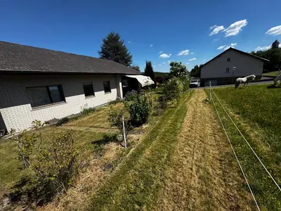 Ein Garten an der Unterkunft Der Schreiner