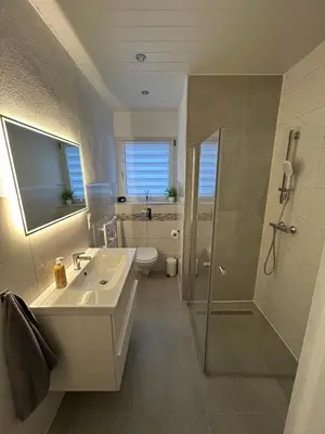Ein Badezimmer in der Unterkunft Ferienwohnung - Am Eisenberg