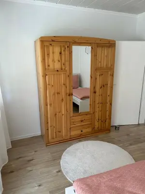 Ein Bett oder Betten in einem Zimmer der Unterkunft Ferienwohnung - Am Eisenberg
