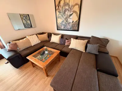 Ein Sitzbereich in der Unterkunft Haus Glücksmomente Bostalsee