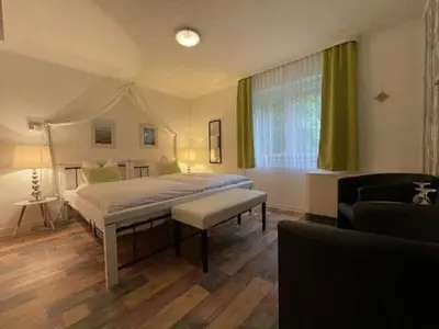 Ein Bett oder Betten in einem Zimmer der Unterkunft Astoria Hotel in Traben-Trarbach