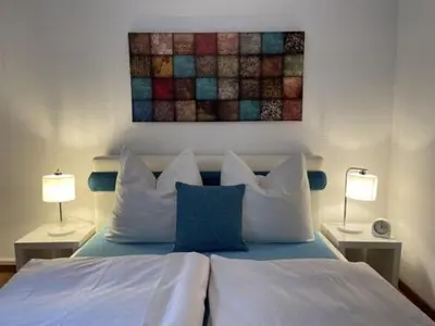Ein Bett oder Betten in einem Zimmer der Unterkunft Astoria Hotel in Traben-Trarbach