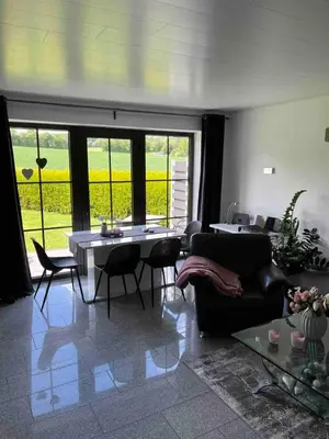 Ein Sitzbereich in der Unterkunft 5-Sterne Wohlfühl-Ferienhaus Eifellust
