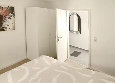 Ein Bett oder Betten in einem Zimmer der Unterkunft Ferienwohnung Balduin
