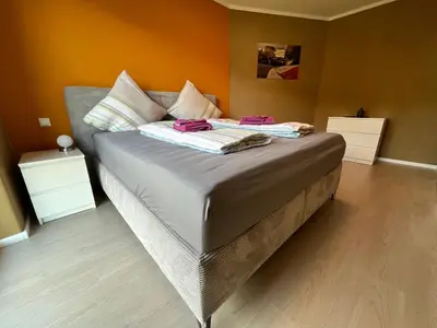 Ein Bett oder Betten in einem Zimmer der Unterkunft Haus Mara