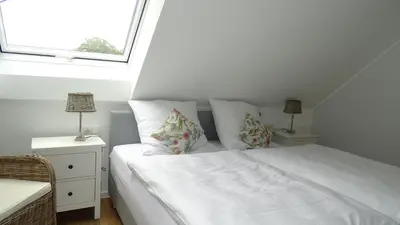 Ein Bett oder Betten in einem Zimmer der Unterkunft Weingut Endesfelder