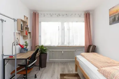 Ein Bett oder Betten in einem Zimmer der Unterkunft Ferienwohnung Sarah für 6 Gäste