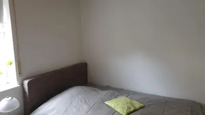 Ein Bett oder Betten in einem Zimmer der Unterkunft Ferienwohnung Emser Hütte