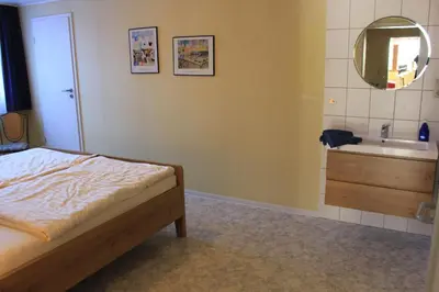 Ein Bett oder Betten in einem Zimmer der Unterkunft Weingut Gorges-Reinhard
