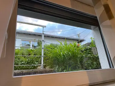 Ein Garten an der Unterkunft Zimmer 2 inkl eigenem Bad