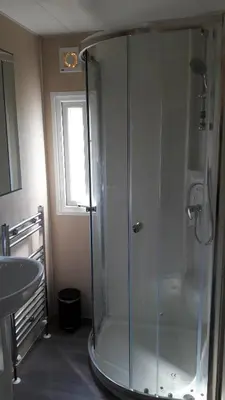 Ein Badezimmer in der Unterkunft Ferienhaus 2 Chalet