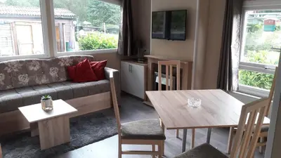 Ein Sitzbereich in der Unterkunft Ferienhaus 2 Chalet