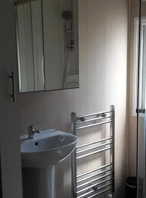 Ein Badezimmer in der Unterkunft Ferienhaus 2 Chalet