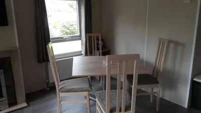 Ein Sitzbereich in der Unterkunft Ferienhaus 2 Chalet