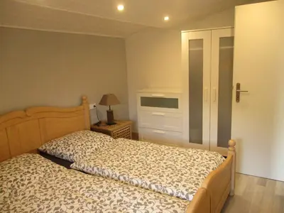 Ein Bett oder Betten in einem Zimmer der Unterkunft Ferienhaus 1