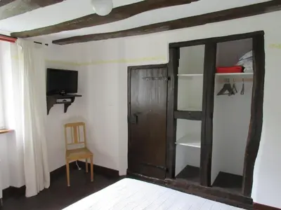 Ein Bett oder Betten in einem Zimmer der Unterkunft Historisches Ferienhaus Abteistraße
