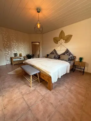 Ein Bett oder Betten in einem Zimmer der Unterkunft Ruhepol Hochwald