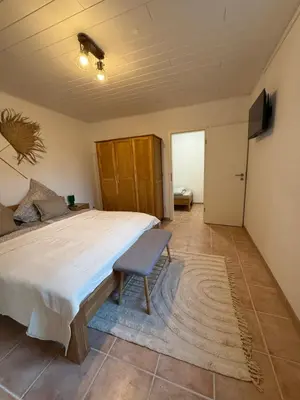 Ein Bett oder Betten in einem Zimmer der Unterkunft Ruhepol Hochwald