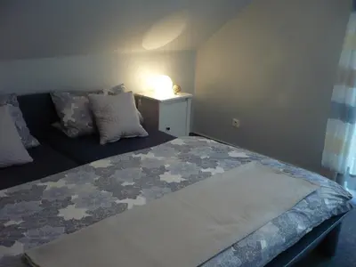Ein Bett oder Betten in einem Zimmer der Unterkunft Ferienwohnungen Meindl
