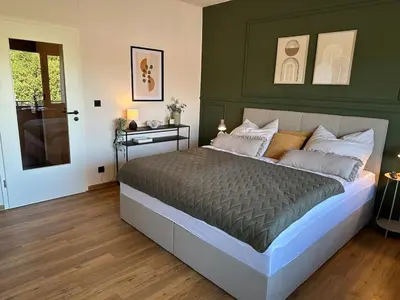 Ein Bett oder Betten in einem Zimmer der Unterkunft Festungsblick am Rhein - Panorama Suite