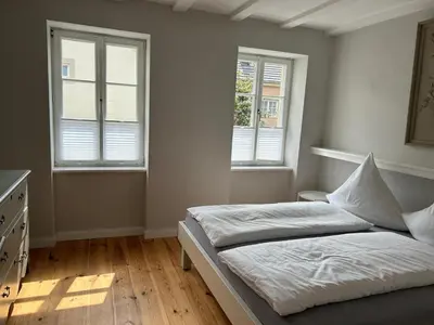 Ein Bett oder Betten in einem Zimmer der Unterkunft gemütliches Ferienhaus nahe Trier