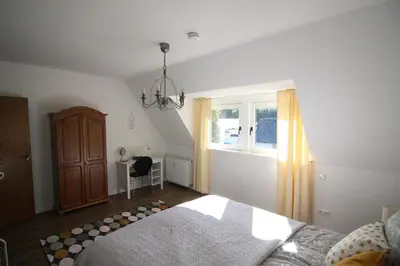 Ein Bett oder Betten in einem Zimmer der Unterkunft Alte Praxis - Zentral & ruhig in Simmern! Stellplatz