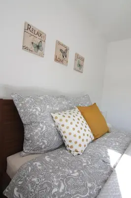 Ein Bett oder Betten in einem Zimmer der Unterkunft Alte Praxis - Zentral & ruhig in Simmern! Stellplatz