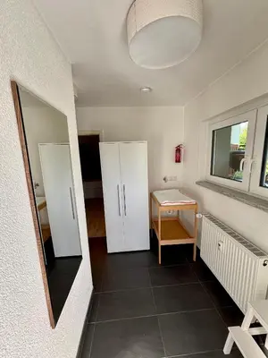 Ein Bett oder Betten in einem Zimmer der Unterkunft Ferienwohnung Sonnenwinkel