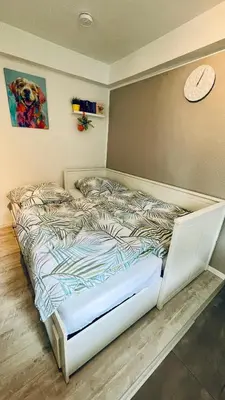 Ein Bett oder Betten in einem Zimmer der Unterkunft Ferienwohnung Sonnenwinkel