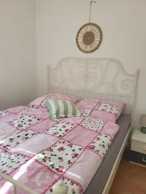 Ein Bett oder Betten in einem Zimmer der Unterkunft Ferienwohnung für 5 Personen in Breitenthal Nähe Idar-Oberstein