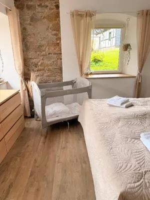 Ein Bett oder Betten in einem Zimmer der Unterkunft Eifel Apartment