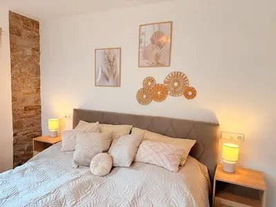 Ein Bett oder Betten in einem Zimmer der Unterkunft Eifel Apartment