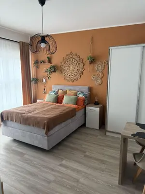 Ein Bett oder Betten in einem Zimmer der Unterkunft Desert Rose 34 in Mayen
