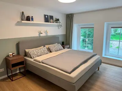 Ein Bett oder Betten in einem Zimmer der Unterkunft JUPAS - Premium Apartments Trier