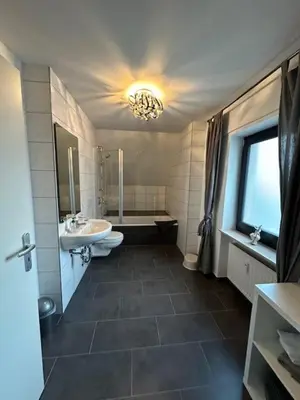 Ein Badezimmer in der Unterkunft Ferienwohnung JODIS