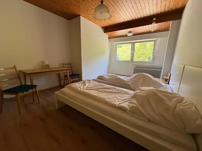 Ein Bett oder Betten in einem Zimmer der Unterkunft Hotel am Wehr