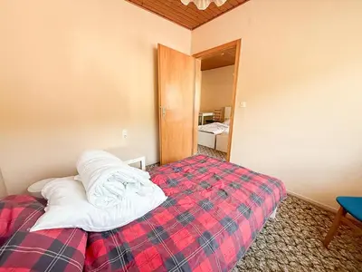 Ein Bett oder Betten in einem Zimmer der Unterkunft Hotel am Wehr