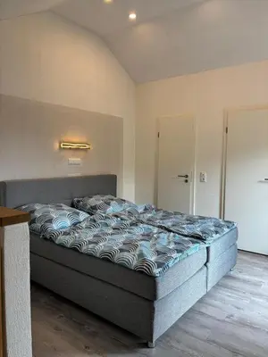 Ein Bett oder Betten in einem Zimmer der Unterkunft Wohlfühloase am Nürburgring
