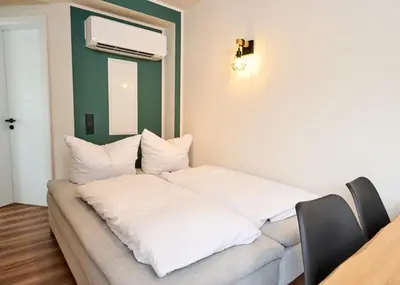 Ein Bett oder Betten in einem Zimmer der Unterkunft Luxuscontainer am Nürburgring #4