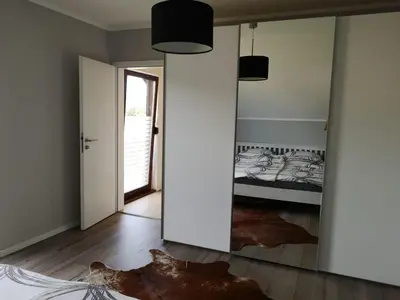 Ein Bett oder Betten in einem Zimmer der Unterkunft Ferienwohnung 