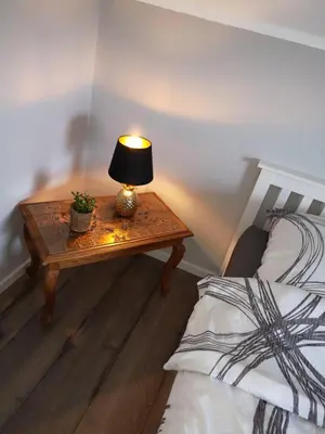 Ein Bett oder Betten in einem Zimmer der Unterkunft Ferienwohnung 