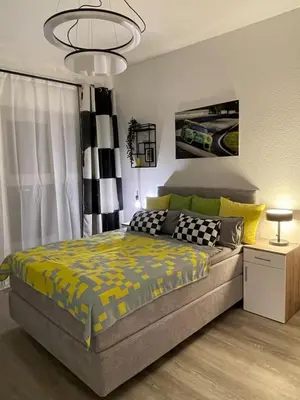 Ein Bett oder Betten in einem Zimmer der Unterkunft 36 Nürburgring in Mayen