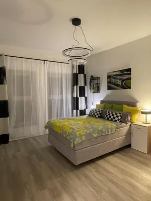 Ein Bett oder Betten in einem Zimmer der Unterkunft 36 Nürburgring in Mayen