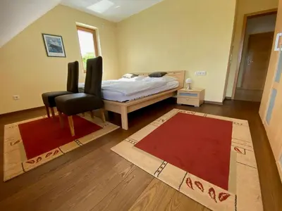 Ein Bett oder Betten in einem Zimmer der Unterkunft Ferienwohnung Schlossberg Panoramamoselblick