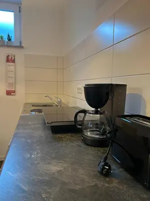 Küche/Küchenzeile in der Unterkunft City Apartment nähe Universität